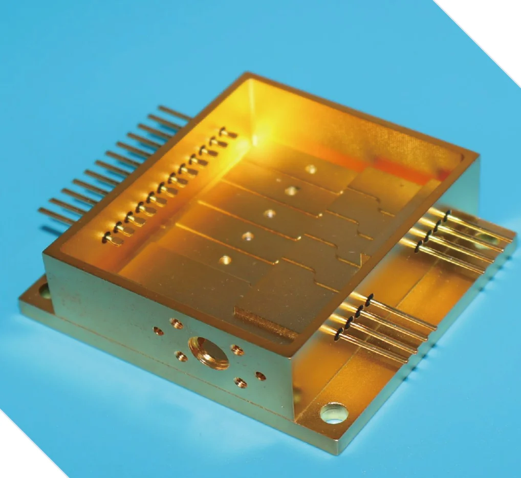 Gold precision package housing with machined cavity and connection pins